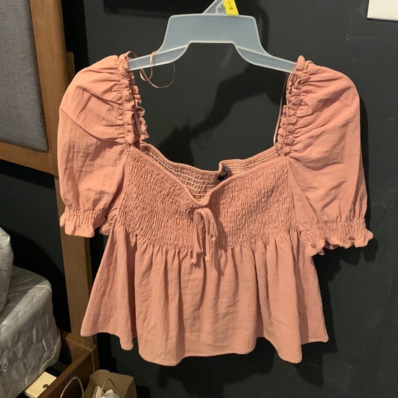 Tops - light pink ruffled blouse